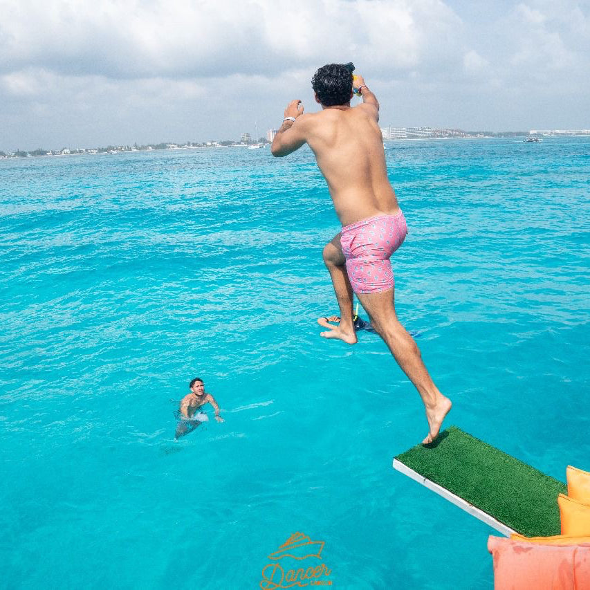 Catamarán Dancer Cancún a Isla Mujeres – Fiesta, Barra Libre Premium y Snorkel