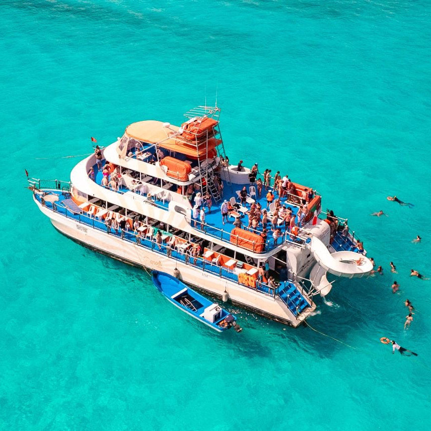 Catamarán Dancer Cancún a Isla Mujeres – Fiesta, Barra Libre Premium y Snorkel